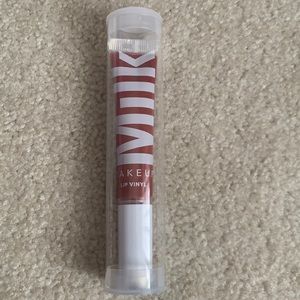 Milk makeup Lip Vinyl NWT UNUSED AND UNOPENED “FACTS”